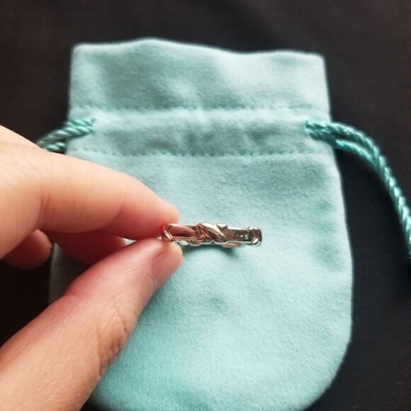 Size 7.5 Tiffany Signature X Kiss Ring in Black Enamel and  Tiffany & Co. Silver Kiss Ring